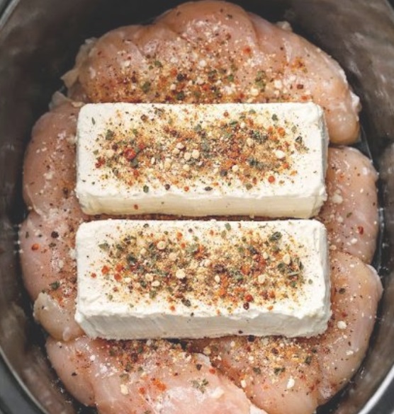Add raw chicken breasts to the crockpot, layer with cream cheese, and serve a meal so flavorful your family will be asking for seconds.