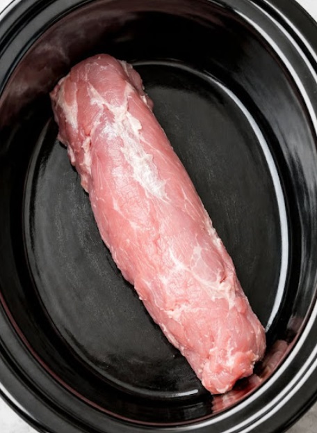Dump a whole pork tenderloin in the slow cooker with 3 simple ingredients and your husband will swear you spent all day cooking.