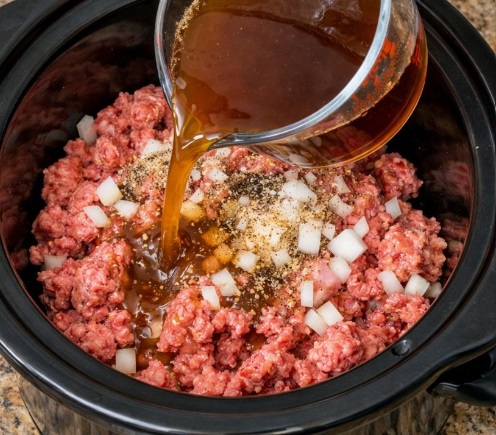 Pour beef broth over ground beef, together with 3 ingredients, into slow cooker for a comforting dinner that’s my default when I don’t know what to make