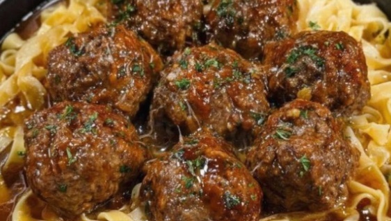 I came home worn out and my husband had this waiting on the stove. Tender meatballs and buttery noodles in a savory sauce — comfort in every forkful.