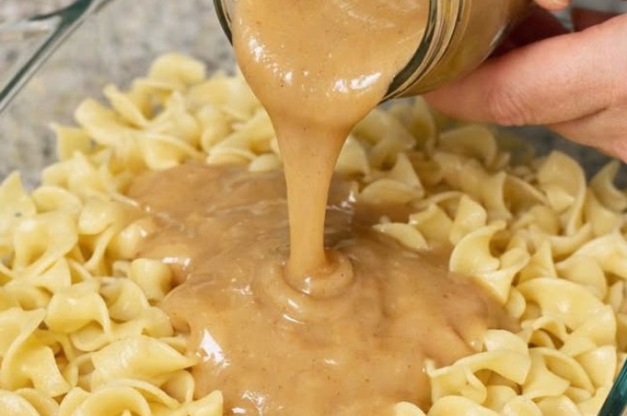 Pour jarred chicken gravy and these 2 ingredients over uncooked egg noodles into a glass dish for a hearty dinner you will want on repeat