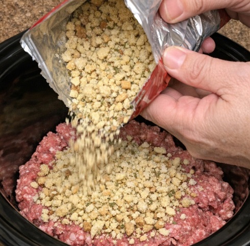 Dump dry stuffing mix over raw ground beef, together with 3 ingredients, into slow cooker for a hearty meal that I make without even thinking