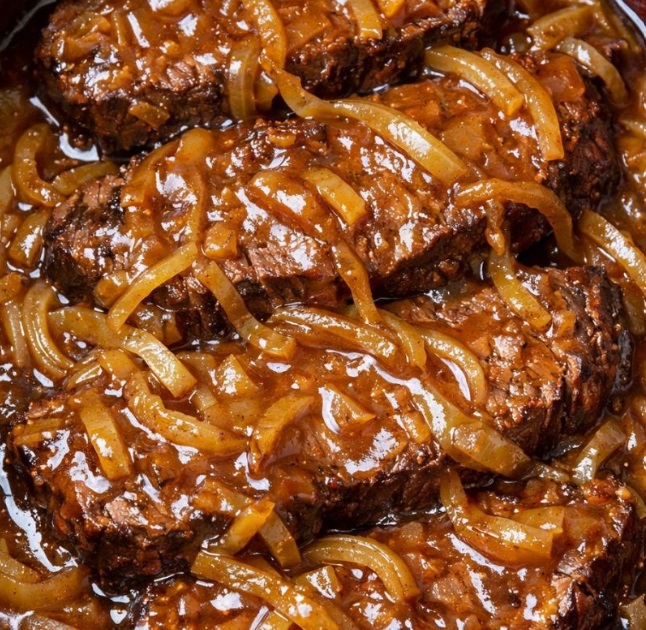 This is what Mom always made when she wanted to impress guests. The onion gravy is so good you will want to drink it